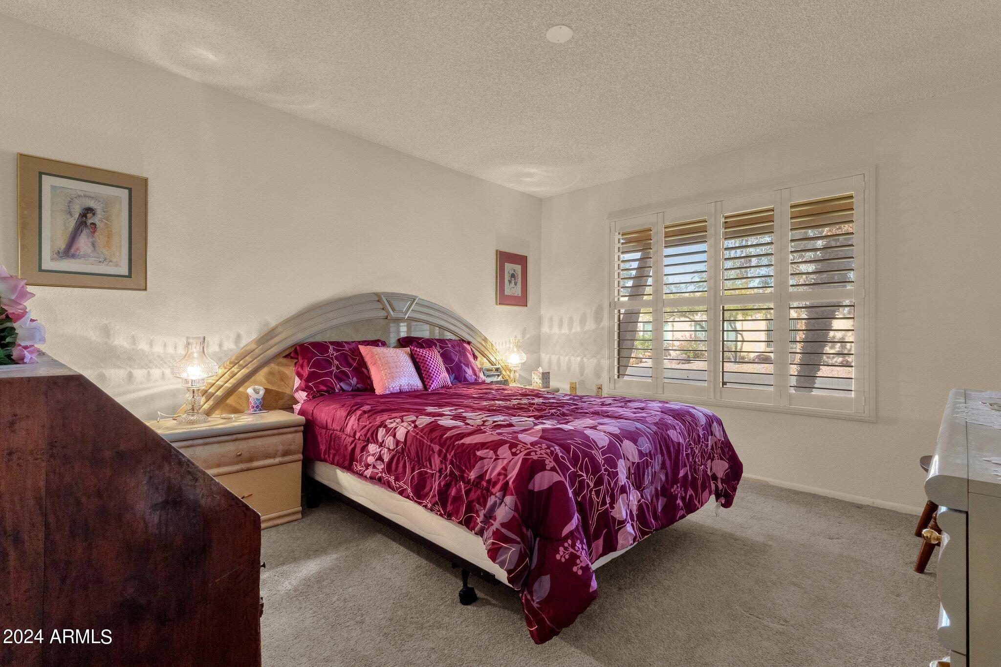 14300 West Bell Road, Unit 64 Surprise, AZ 85374 - Photo 11 of 18 Primary Bedroom