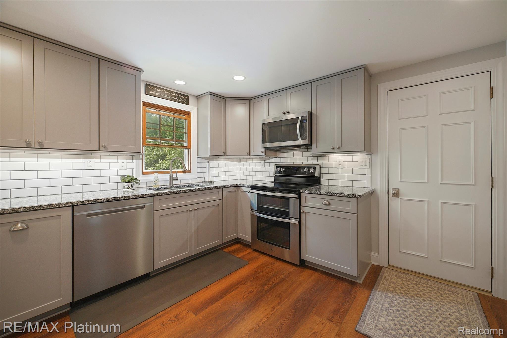 7055 West Allen Road Fowlerville, MI 48836 - Photo 7 of 34 006-photo-kitchen-9469663.jpg