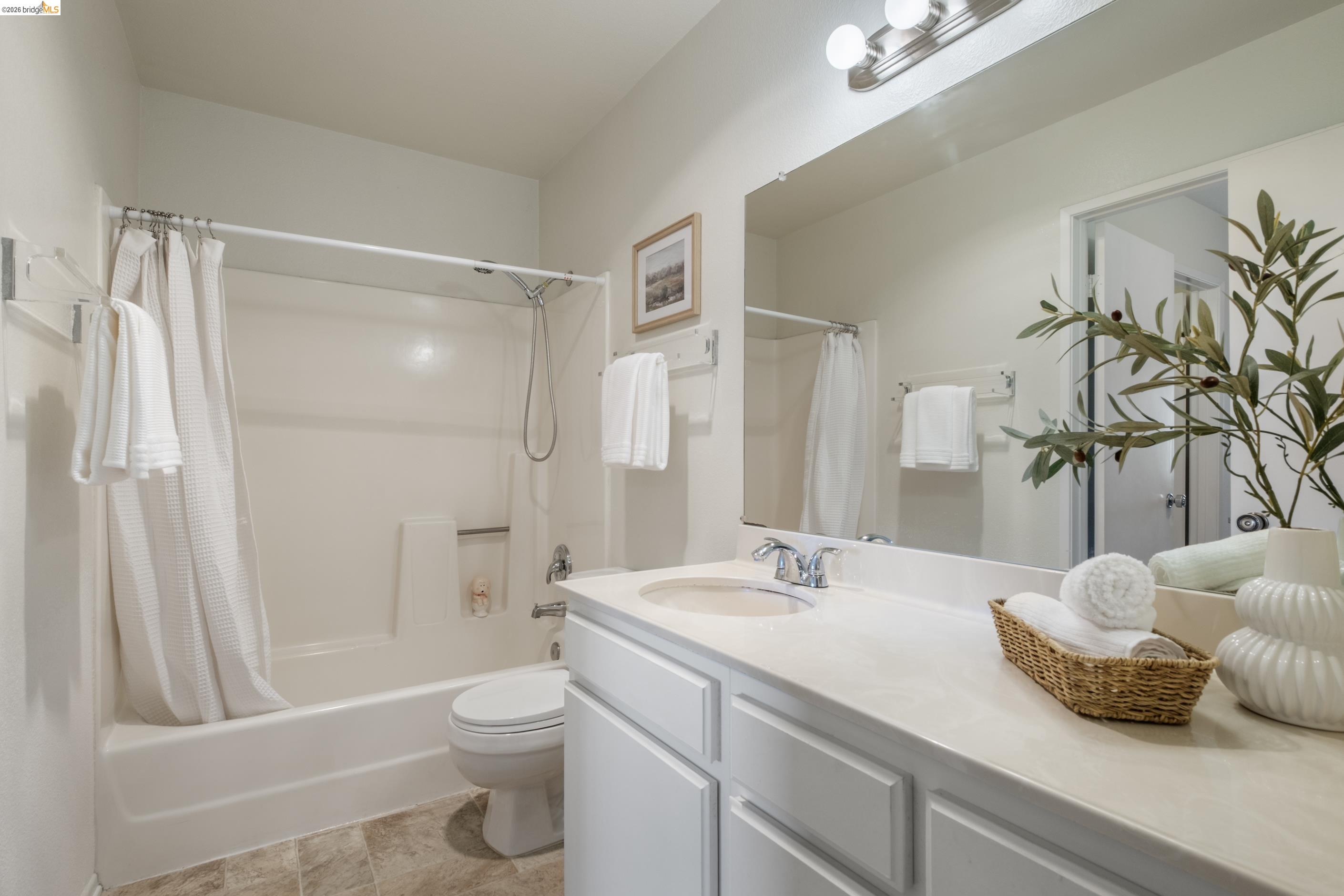 214 Apollo, Unit 3 Hercules, CA 94547 - Photo 15 of 26 Bathroom with vanity and shower / tub combo with curtain