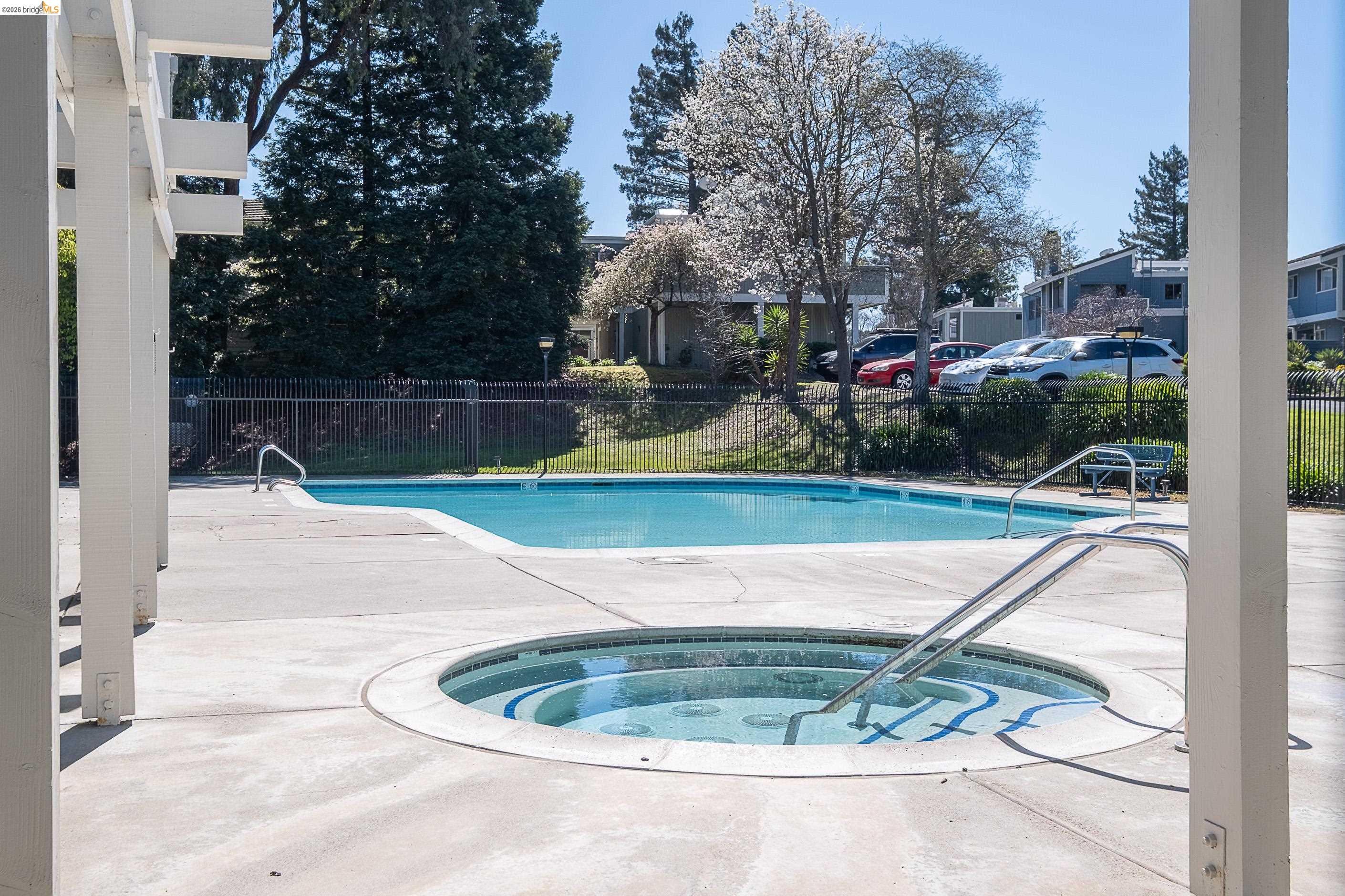 214 Apollo, Unit 3 Hercules, CA 94547 - Photo 25 of 26 Community pool featuring a community hot tub and a patio area