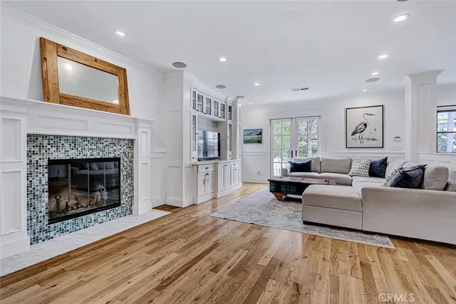 a white bath tub sitting next to a window