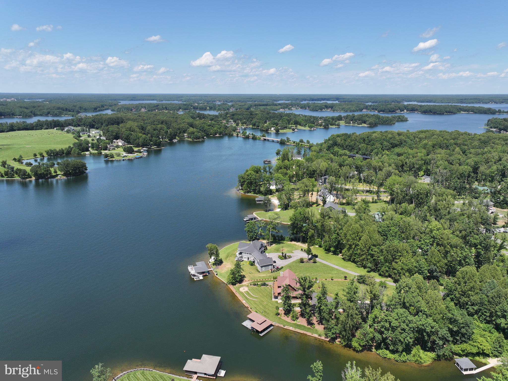 Lot 31 Boxwood Road Bumpass, VA 23024 - Photo 1 of 11 a view of a lake with a mountain in the background