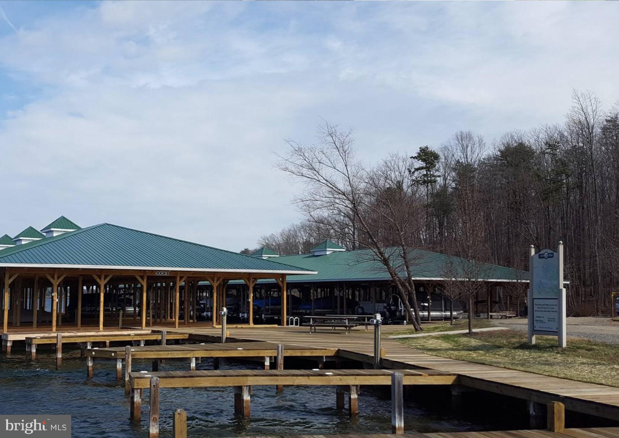 Lot 31 Boxwood Road Bumpass, VA 23024 - Photo 11 of 11 an outdoor view of house with swimming pool and seating