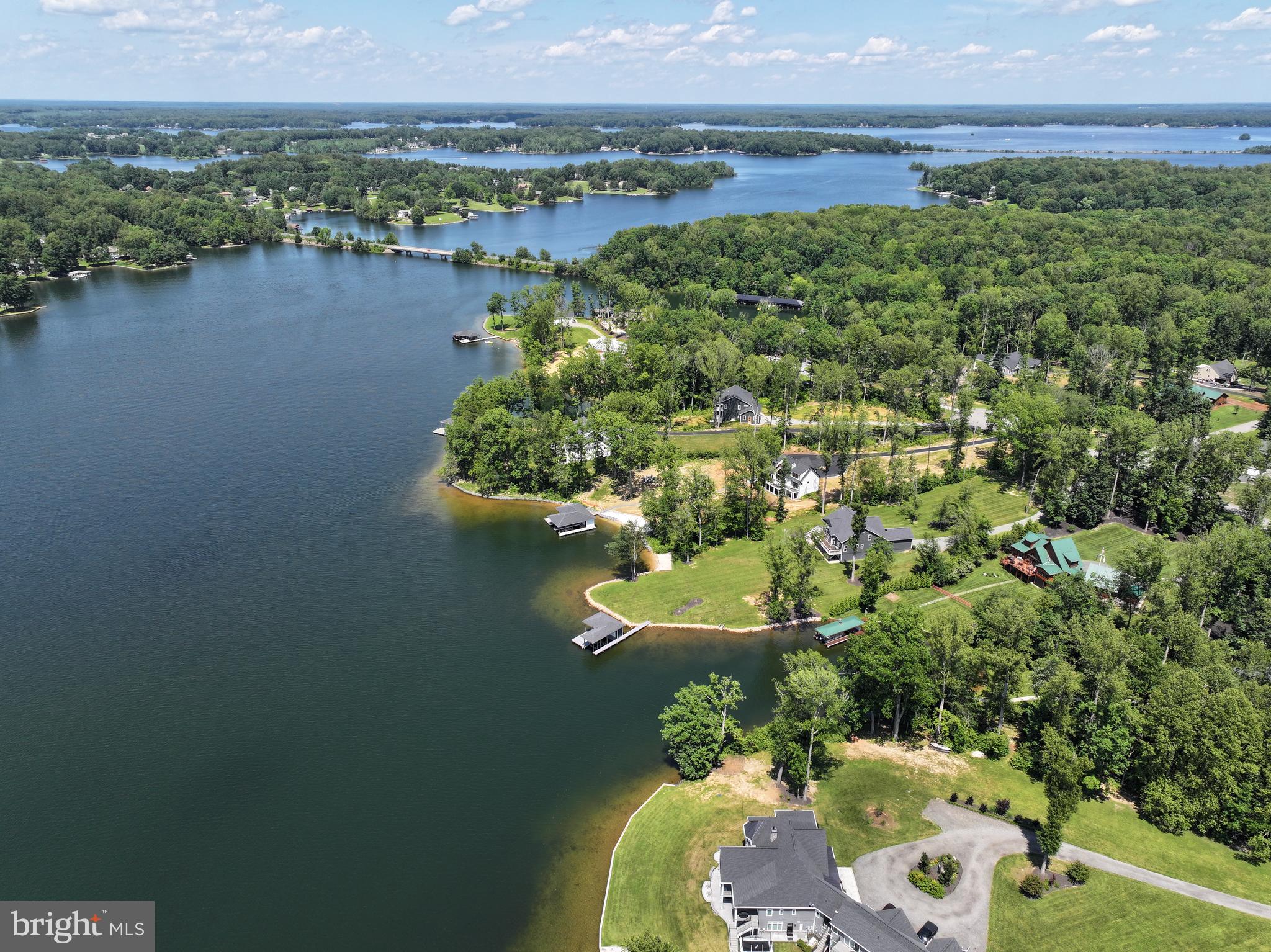 Lot 31 Boxwood Road Bumpass, VA 23024 - Photo 2 of 11 an aerial view of lake residential house with outdoor space