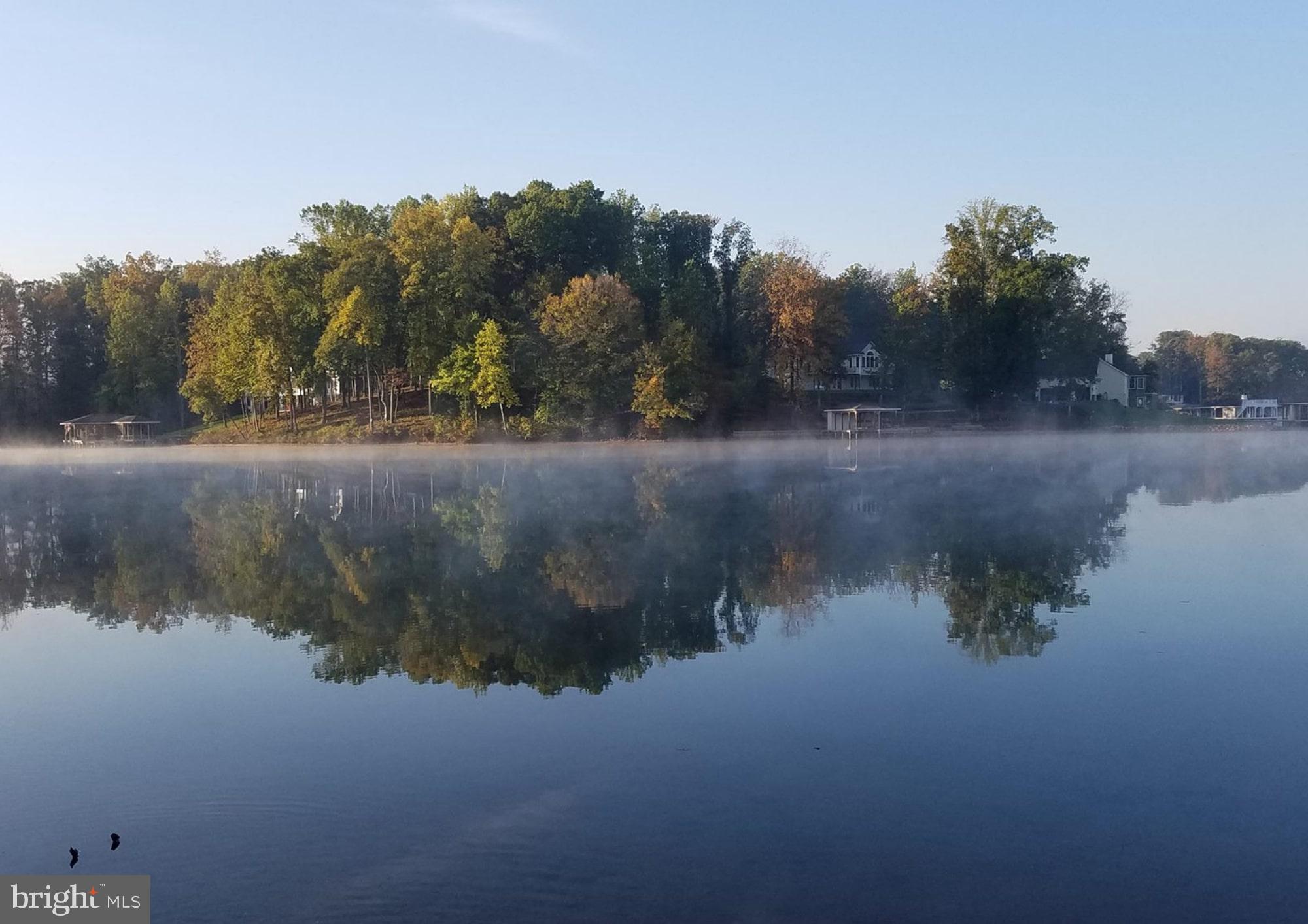Lot 31 Boxwood Road Bumpass, VA 23024 - Photo 7 of 11 a view of lake with green space