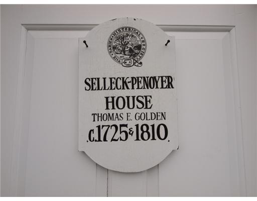 146 Goodwives River Road Darien, CT 06820 - Photo 8 of 13 a sign that is on top of a white cabinet