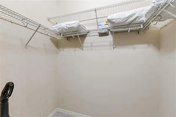 a room with furniture and a flat screen tv