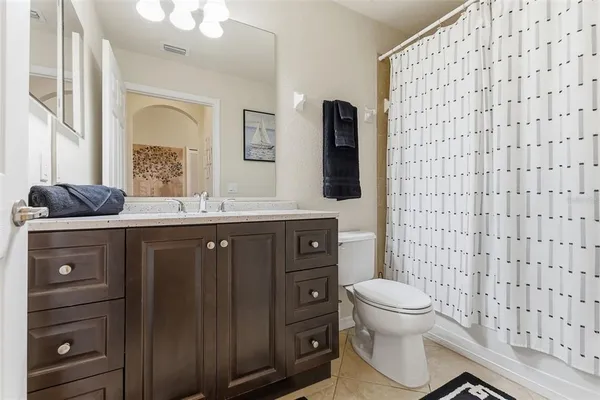 a view of a balcony with furniture