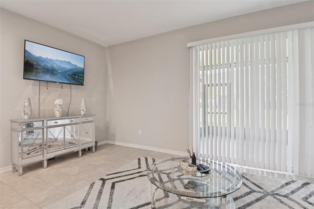 7046 Towne Lake Road Riverview, FL 33578 - Photo 17 of 47 a dining room with a table and chairs