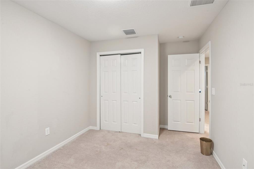 7046 Towne Lake Road Riverview, FL 33578 - Photo 27 of 47 an empty room with closet area