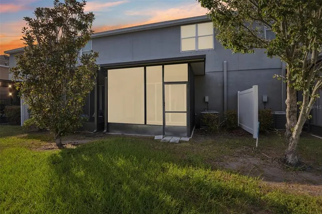 a house view with a backyard space