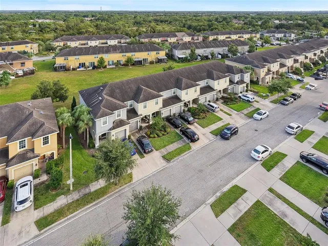 an aerial view of a house with a garden