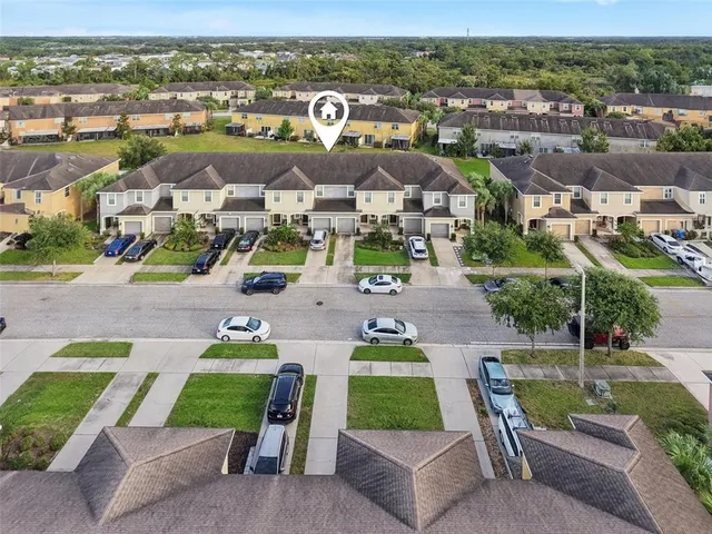 an aerial view of multiple house