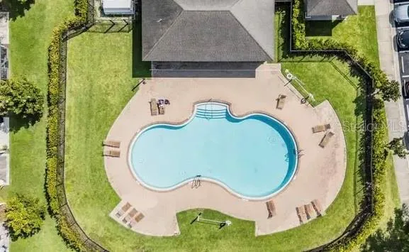 an aerial view of a swimming pool