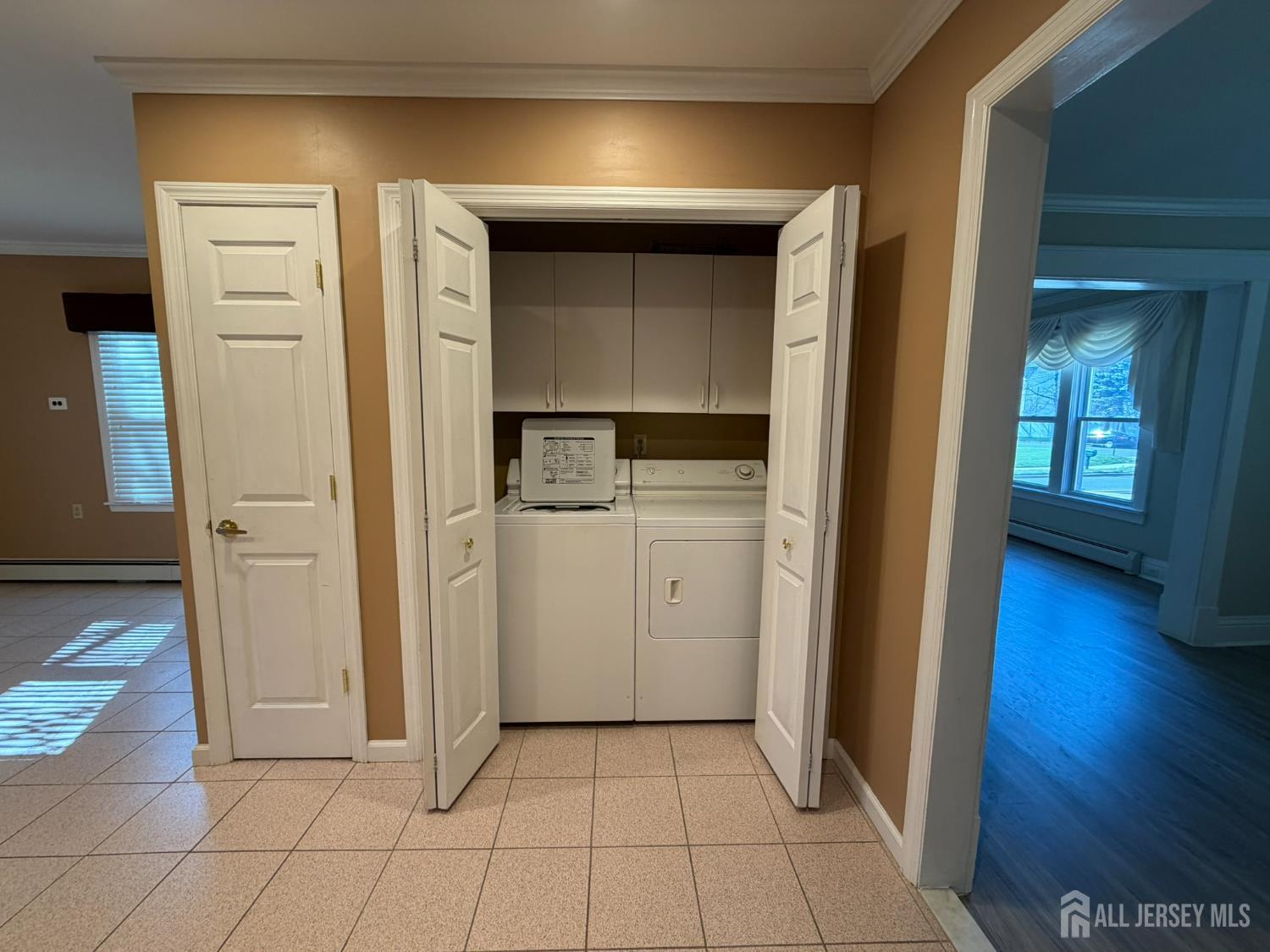 628 Grove Avenue Edison, NJ 08820 - Photo 17 of 21 a view of a hallway with wooden floor