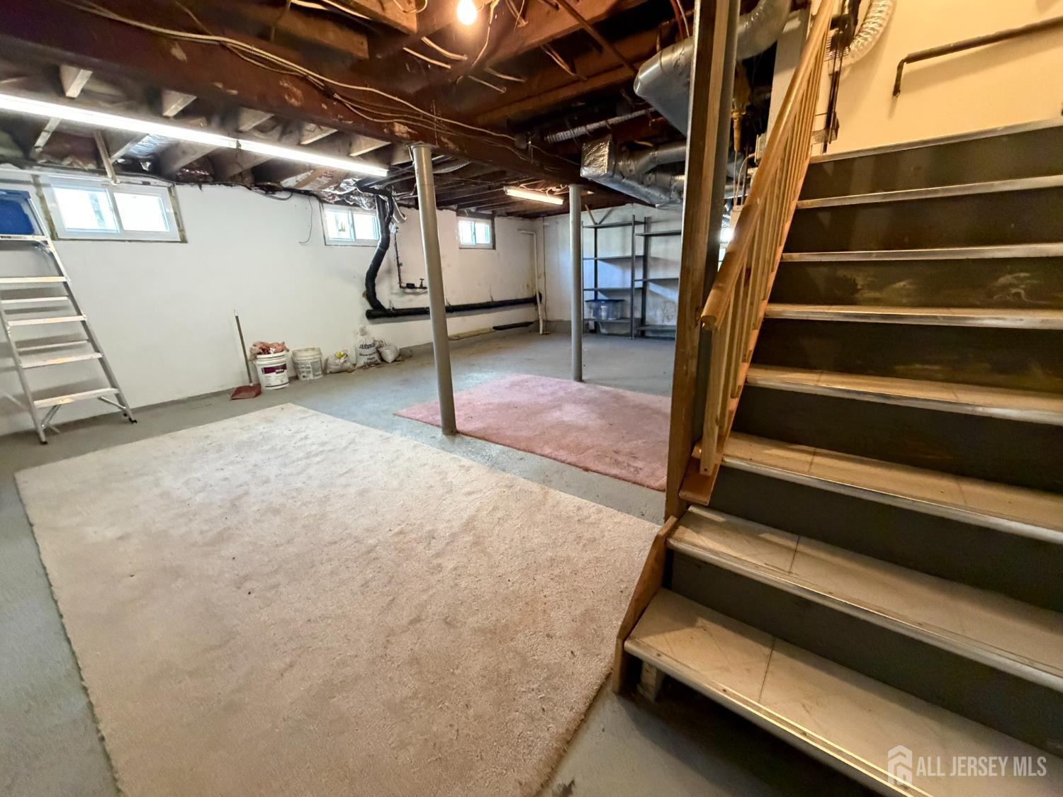 628 Grove Avenue Edison, NJ 08820 - Photo 20 of 21 a view of an empty room with stairs