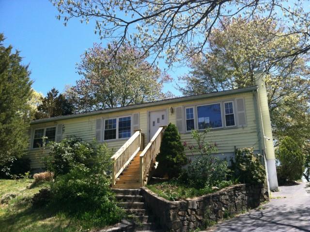 55 Red Oak Road Bridgeport, CT 06606 - Photo 1 of 1 a view of house with backyard space and garden
