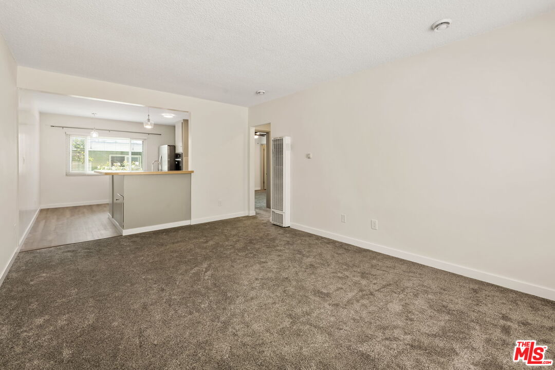 8335 West Manchester Avenue, Unit D Playa del Rey, CA 90293 - Photo 2 of 17 an empty room with windows