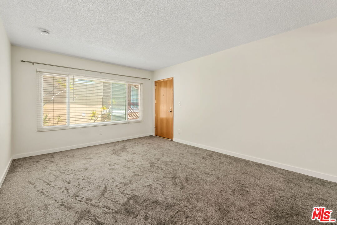 8335 West Manchester Avenue, Unit D Playa del Rey, CA 90293 - Photo 4 of 17 an empty room with windows