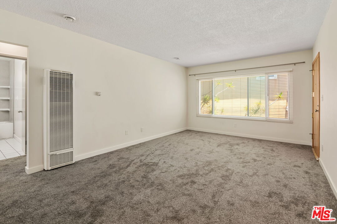 8335 West Manchester Avenue, Unit D Playa del Rey, CA 90293 - Photo 6 of 17 an empty room with windows