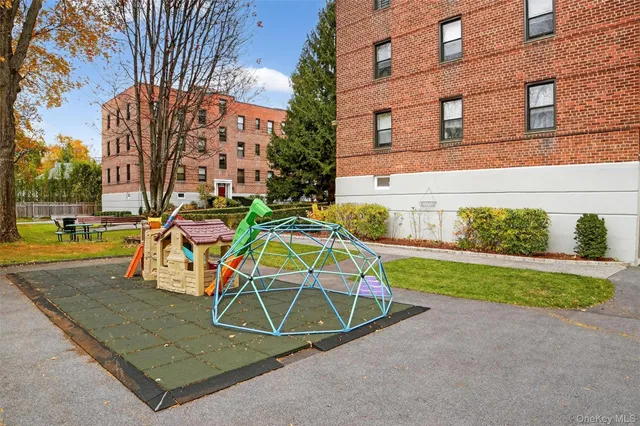 front view of a house with a swimming pool