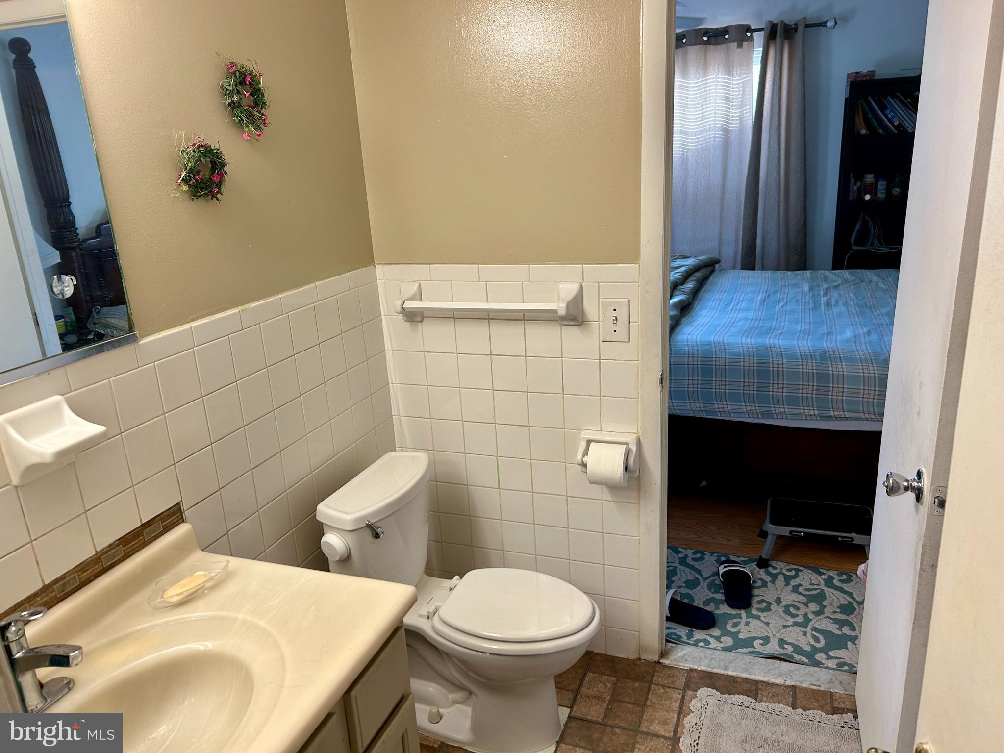 5 Oyster Bay Road Absecon, NJ 08205 - Photo 12 of 15 a bathroom with a sink and toilet