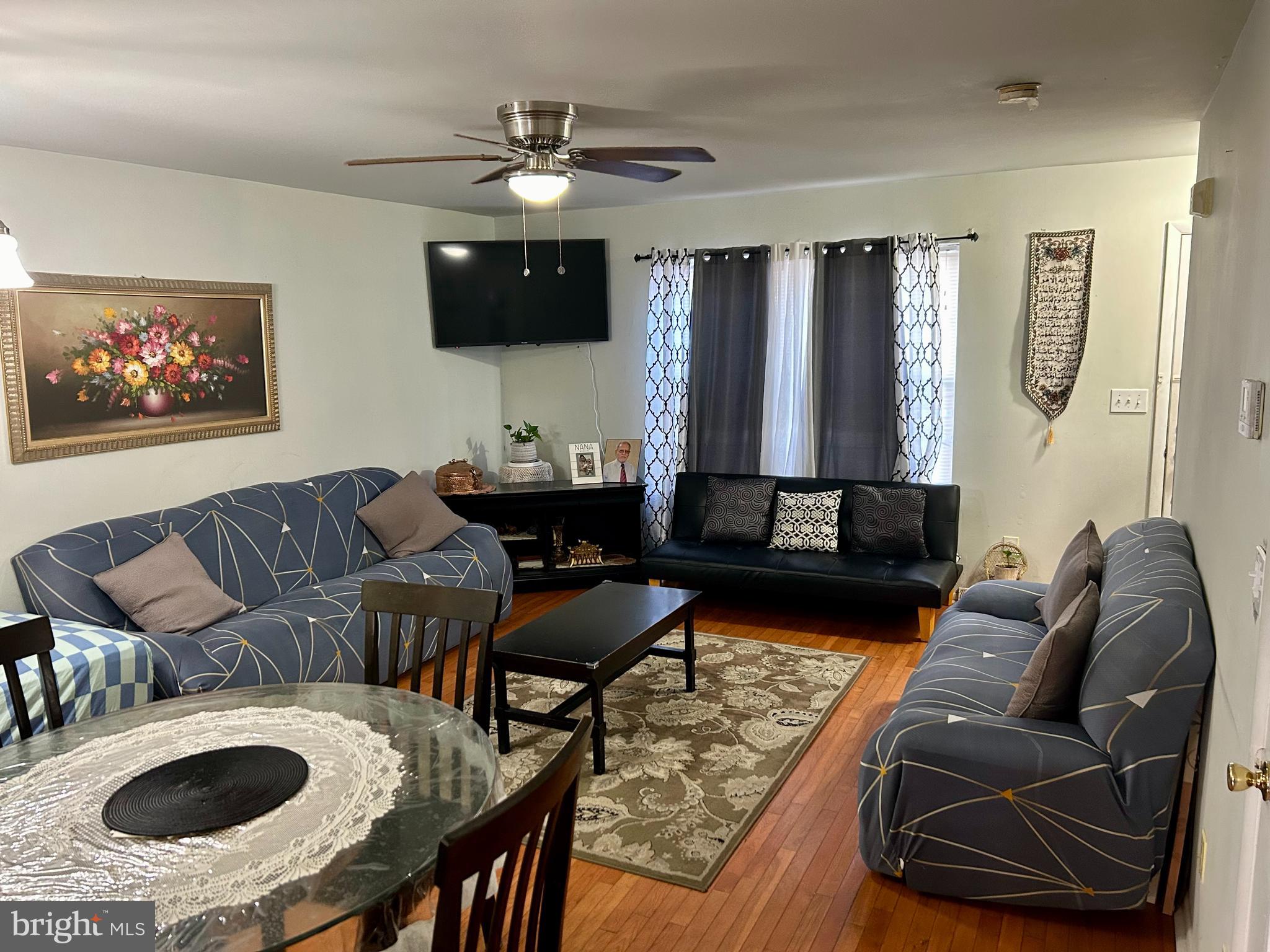 5 Oyster Bay Road Absecon, NJ 08205 - Photo 2 of 15 a living room with furniture and a wooden floor
