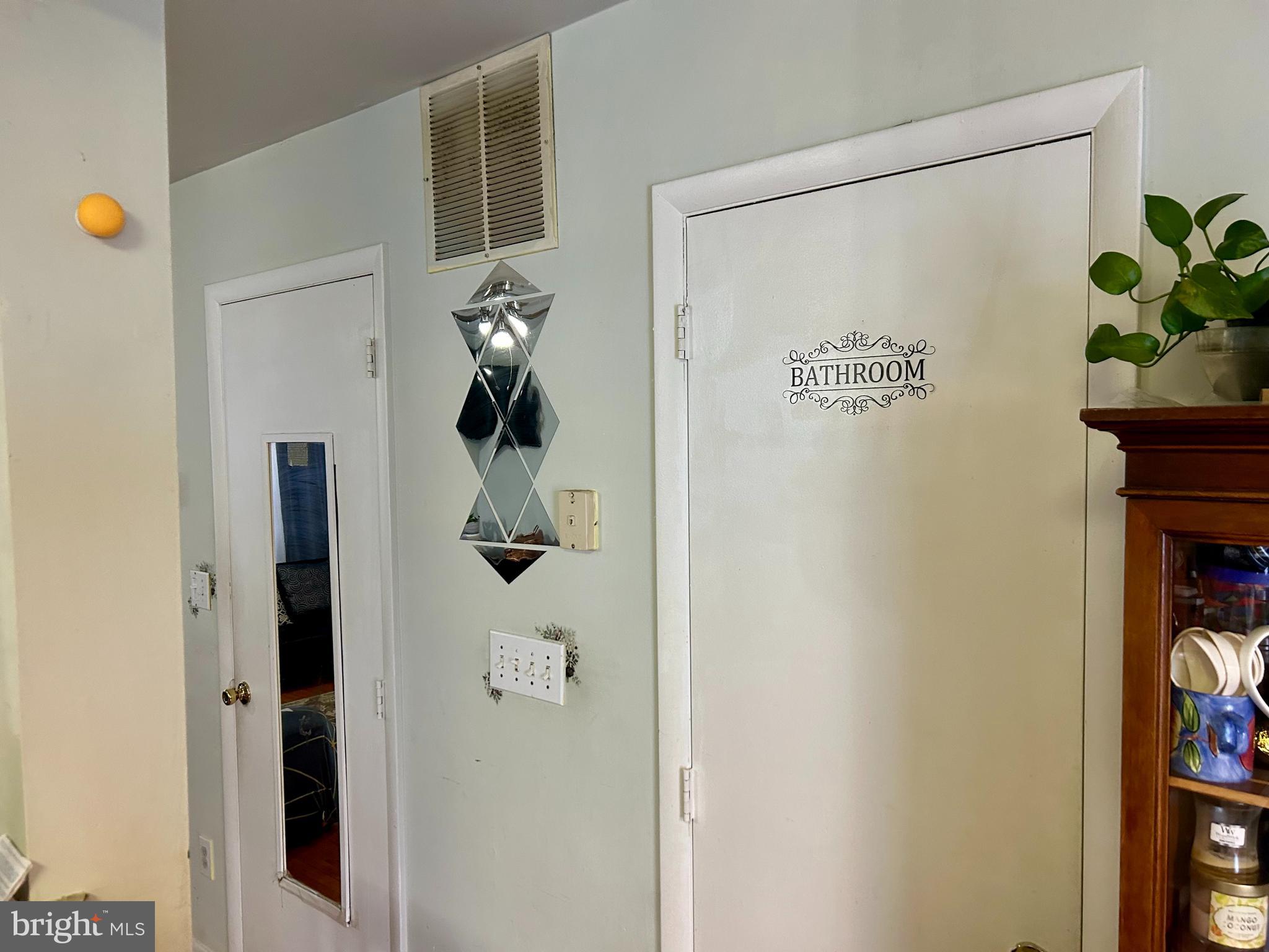 5 Oyster Bay Road Absecon, NJ 08205 - Photo 7 of 15 a picture of a door