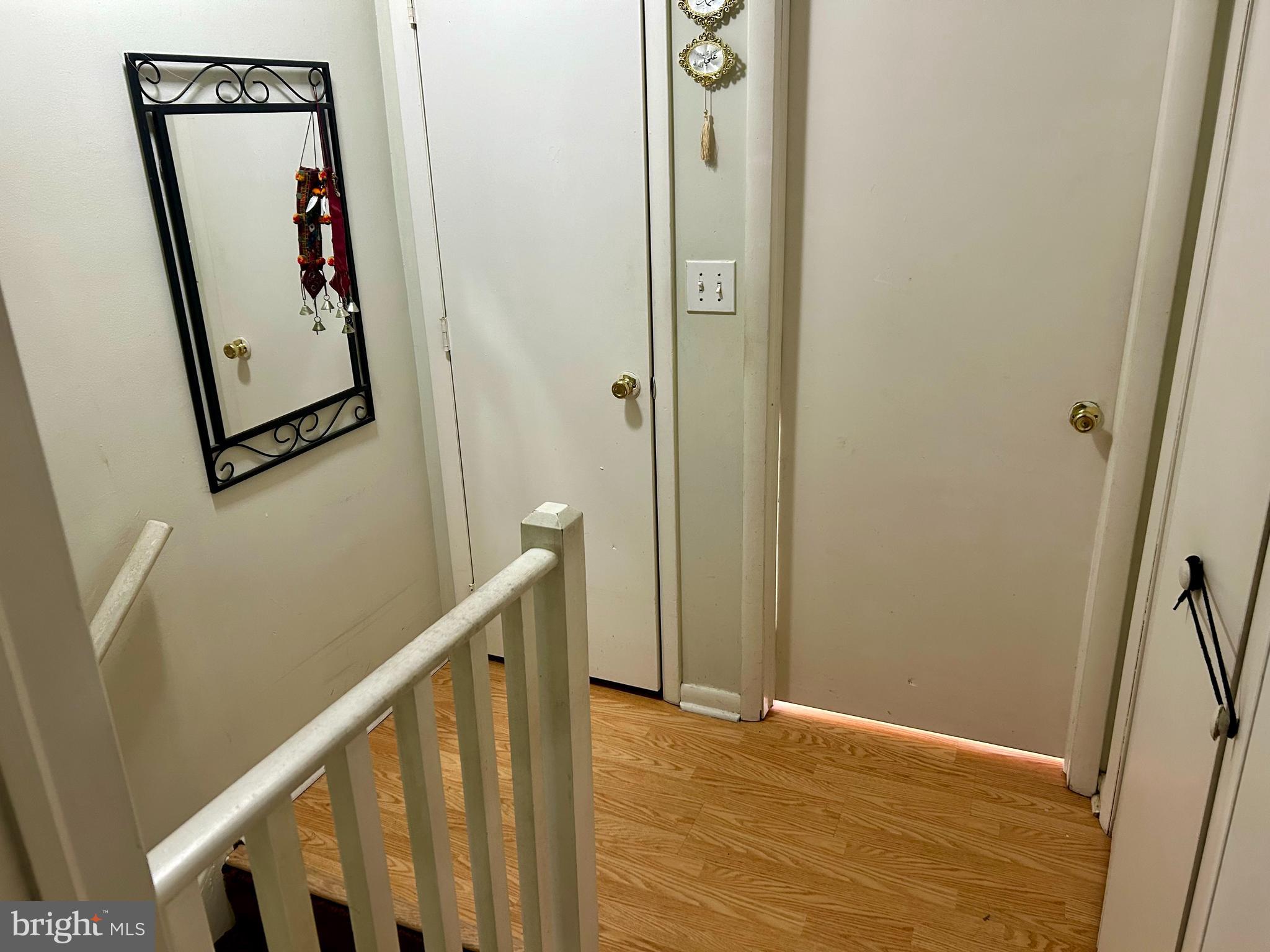 5 Oyster Bay Road Absecon, NJ 08205 - Photo 9 of 15 a view of a hallway with wooden floor and entryway