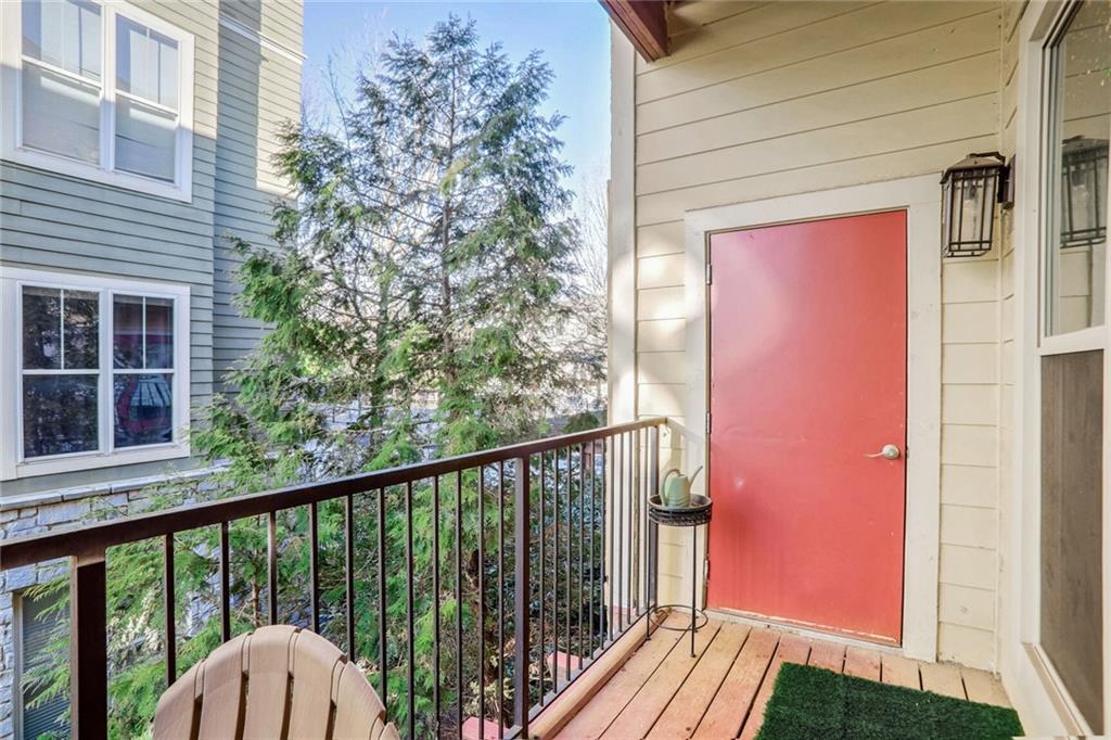 1195 Milton Terrace Southeast, Unit 2203 Atlanta, GA 30315 - Photo 16 of 16 a view of a balcony with an outdoor space