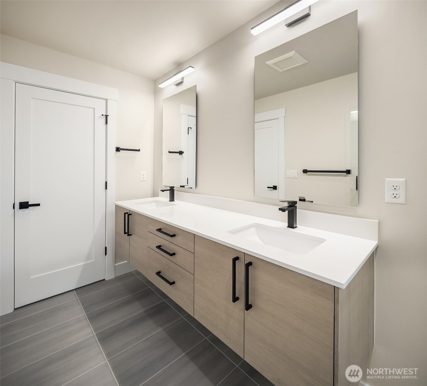 1319 14th Avenue South, Unit A Seattle, WA 98144 - Photo 17 of 27 a bathroom with a sink and a mirror