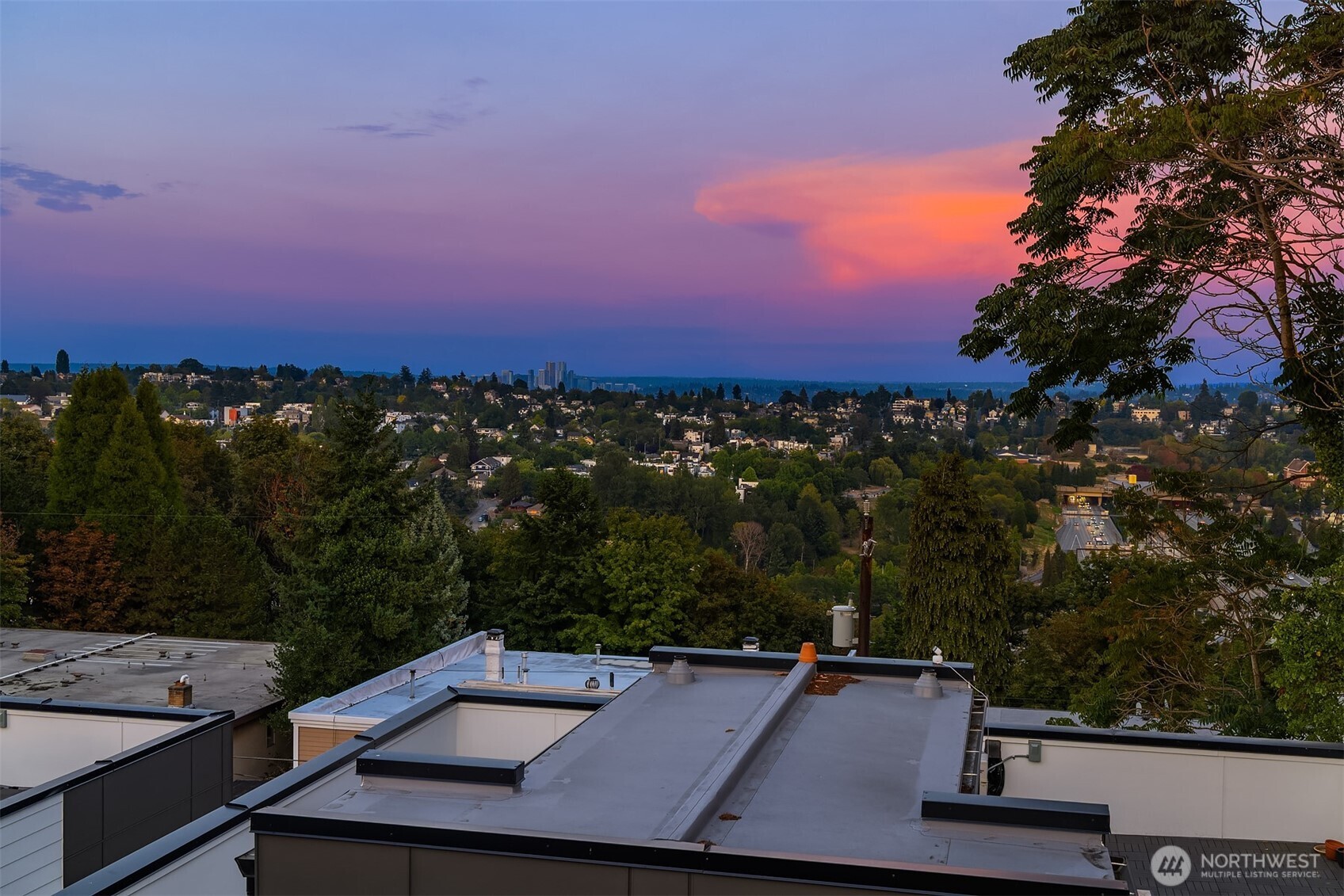 1319 14th Avenue South, Unit A Seattle, WA 98144 - Photo 23 of 27 a view of a balcony with two chairs and a table