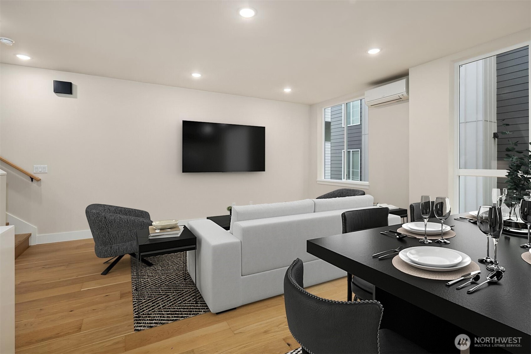 1319 14th Avenue South, Unit A Seattle, WA 98144 - Photo 5 of 27 a living room with furniture and a flat screen tv