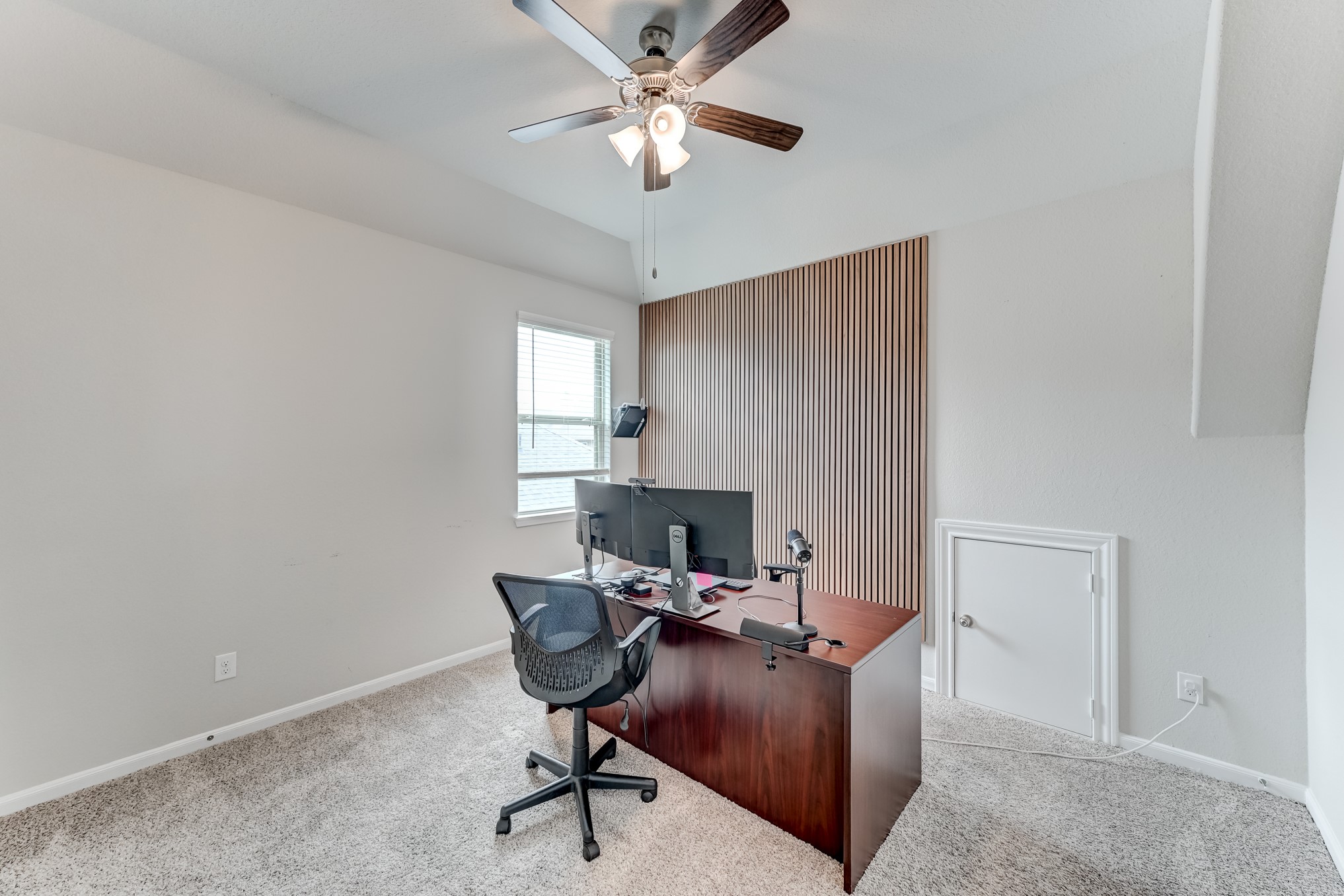 5806 Metaphor Way Rosenberg, TX 77469 - Photo 36 of 50 a view of a workspace with furniture and a window