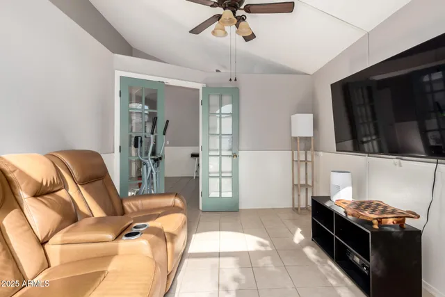 a living room with a couch and a stove