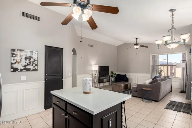 a kitchen with a counter space cabinets and stainless steel appliances