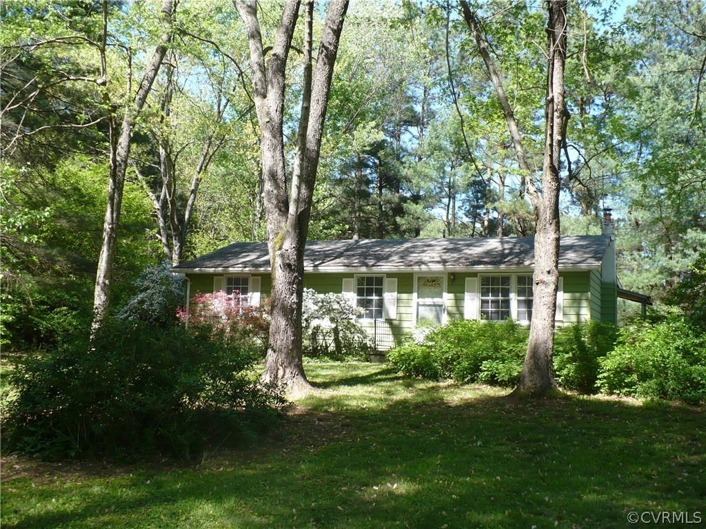 2886 Bethany Church Road Bumpass, VA 23024 - Photo 2 of 18 a view of a house with a garden