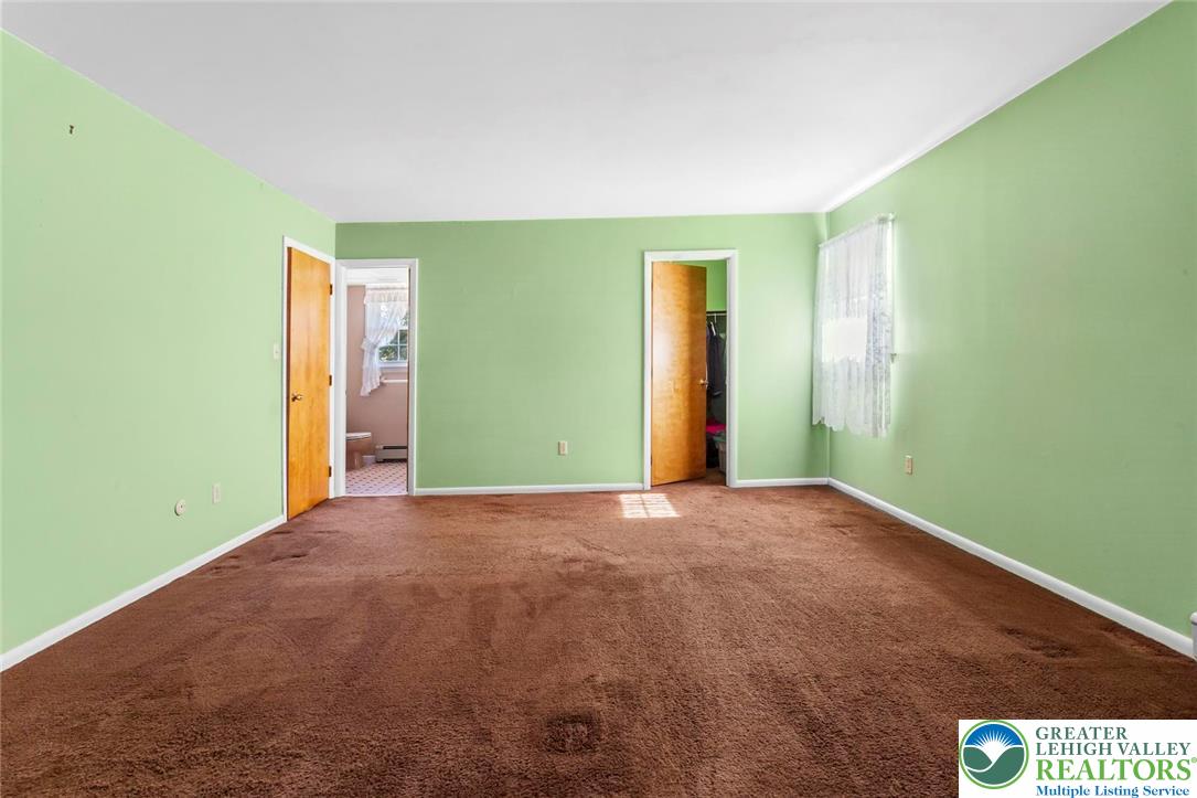 919 Breidinger Road Nazareth, PA 18064 - Photo 13 of 33 a view of an empty room with a window