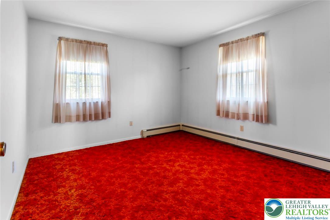 919 Breidinger Road Nazareth, PA 18064 - Photo 18 of 33 an empty room with windows