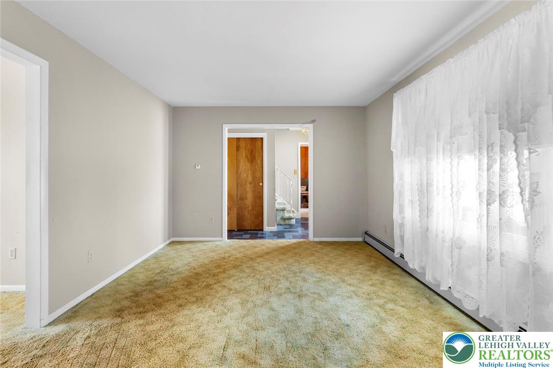 919 Breidinger Road Nazareth, PA 18064 - Photo 2 of 33 an empty room with windows