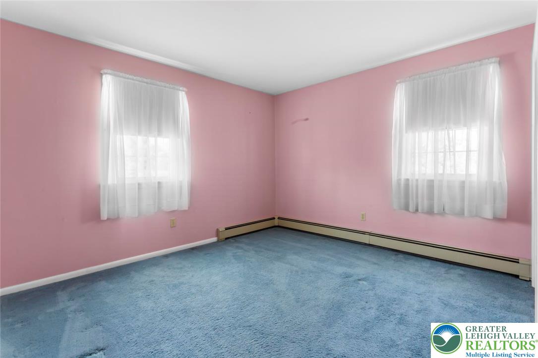 919 Breidinger Road Nazareth, PA 18064 - Photo 23 of 33 a view of an empty room with a window