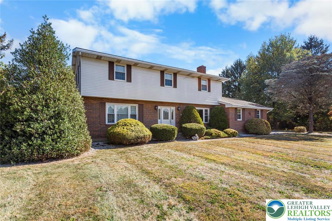 919 Breidinger Road Nazareth, PA 18064 - Photo 32 of 33 a front view of a house with garden
