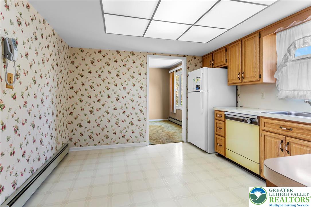 919 Breidinger Road Nazareth, PA 18064 - Photo 6 of 33 a kitchen with a cabinets and a stove