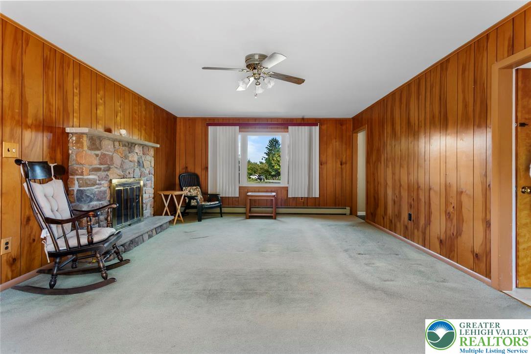 919 Breidinger Road Nazareth, PA 18064 - Photo 10 of 33 a view of a livingroom with furniture and a window