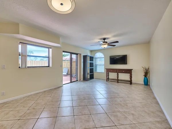 a view of game room with window and workspace