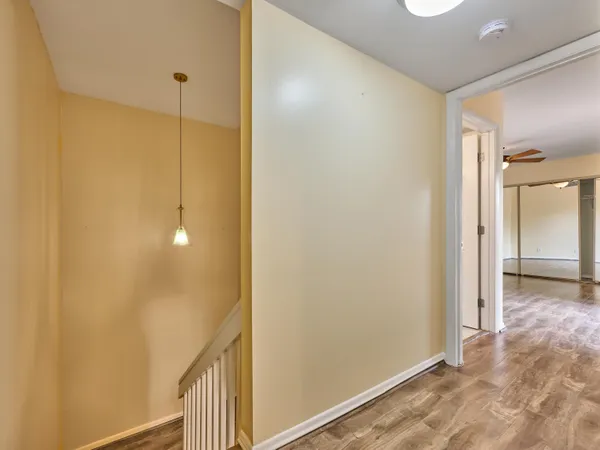 a view of a bathroom from a hallway