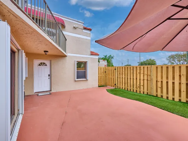 a view of a backyard with a small cabin