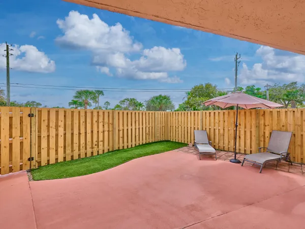a view of a backyard with a small cabin