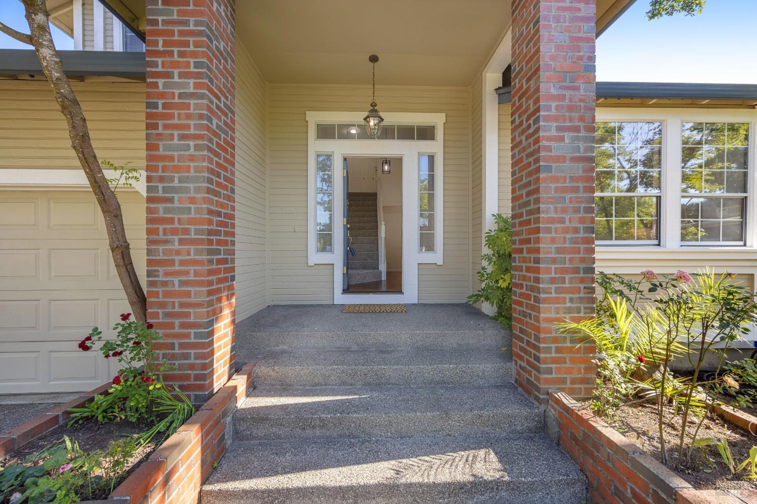 1874 Amy Avenue Santa Rosa, CA 95401 - Photo 3 of 53 The front porch is welcoming with brick planters and columns.