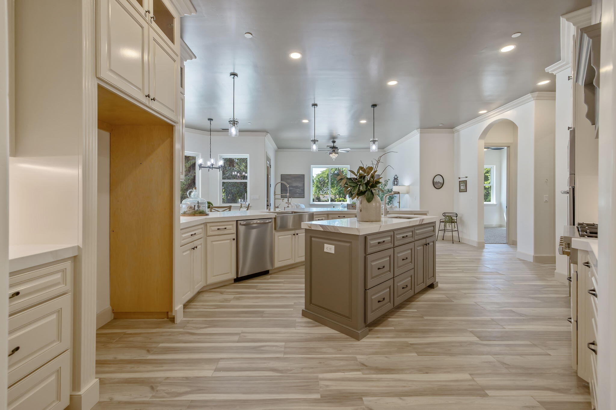 503 East Palm Street Exeter, CA 93221 - Photo 38 of 92 a kitchen with stainless steel appliances kitchen island wooden cabinets and refrigerator
